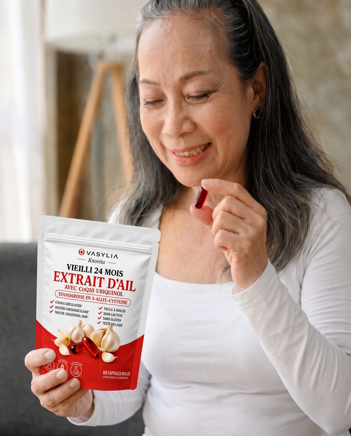 Femme prenant une capsule Vasylia